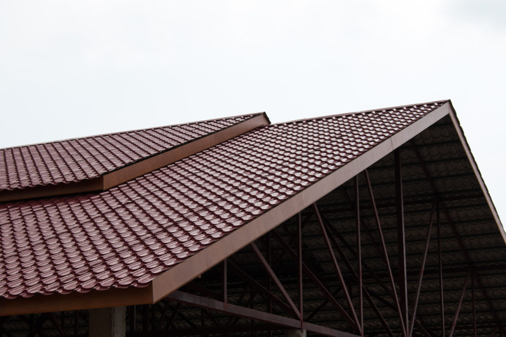 a tiled roof with metal braces